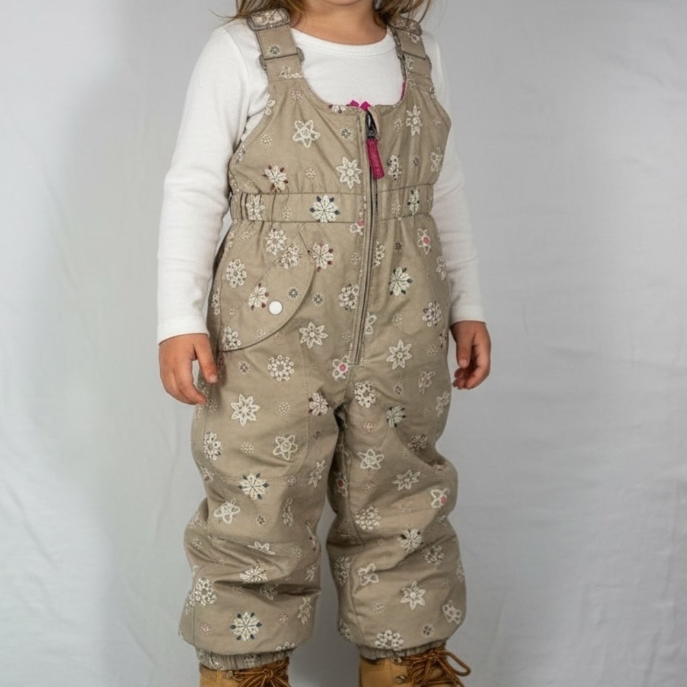 Obermyer Girls Snoveralls Tan with Multi Colored Snowflakes Snow Bibs | I-Grow